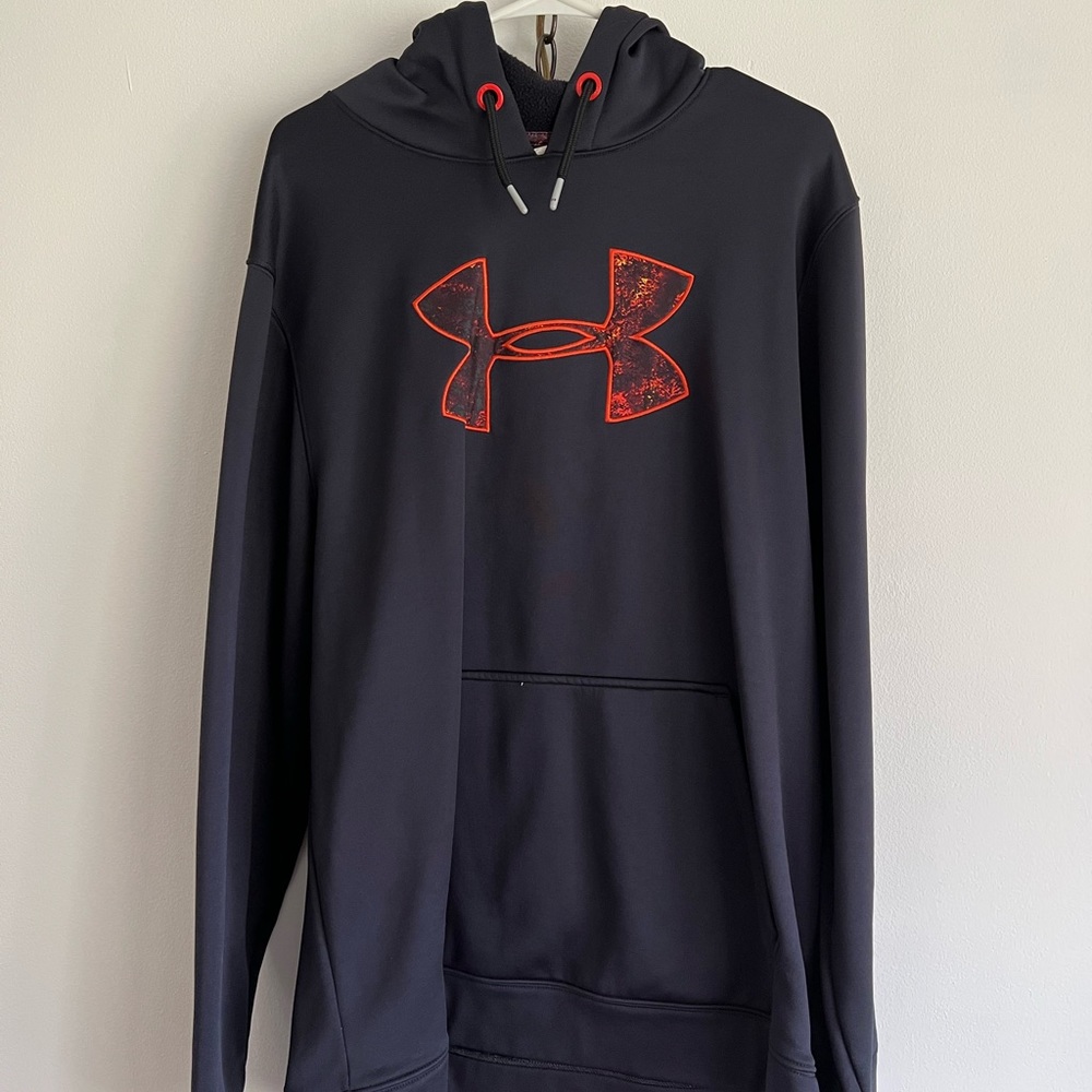 Navy blue Under Armour sweatshirt with orange details. Size XL